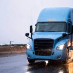 Lafayette Louisiana Truck Accident Personal Injury attorney lawyers blue big rig 18 wheeler in the rain