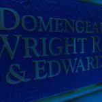 Louisiana Personal Injury Lawyers DWRE blue water sign