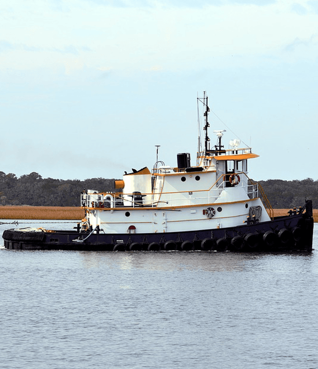 Intracoastal City Louisiana Maritime Injury Lawyers Tugboat pulling in the marsh