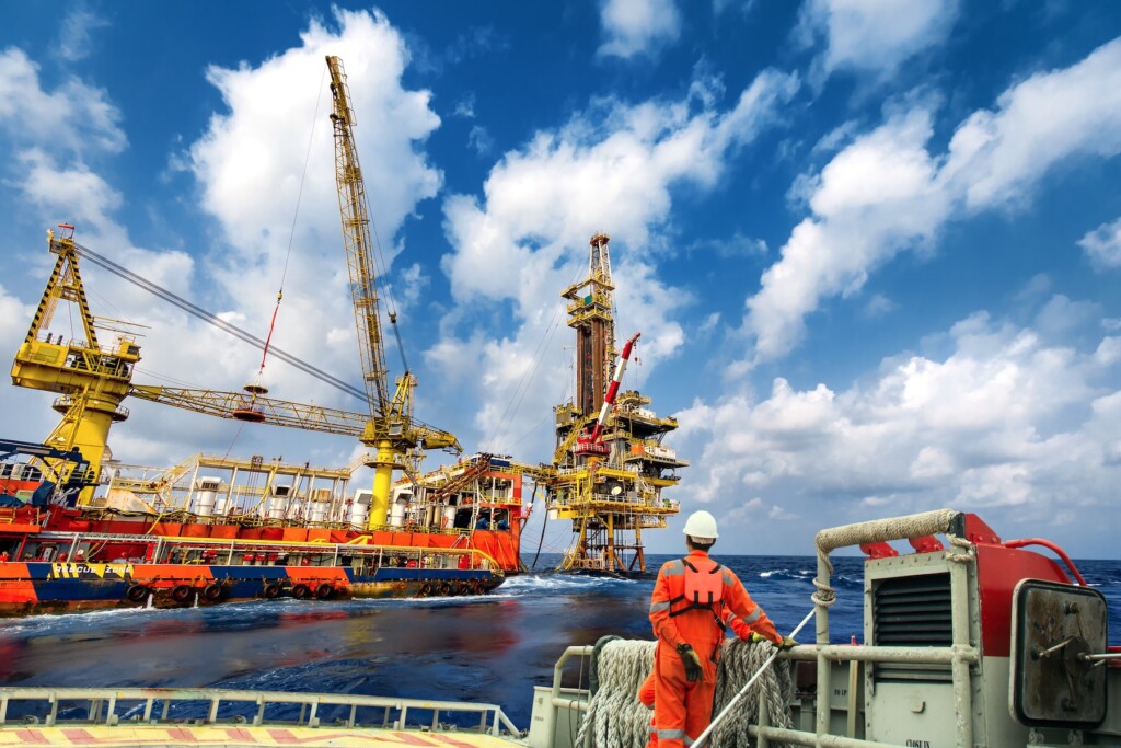 Worker on a crew boat during transfer to platform or drilling rig